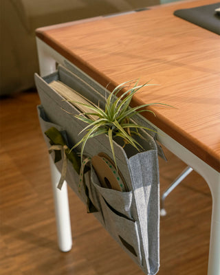 Premium workspace with natural wood furniture and warm interior materials