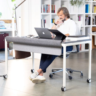 Standing desk with caster wheels