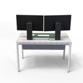 White tenon mini desk with two computer monitors on a white background