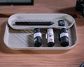 beflo Gobi white desk tray container with stationery items on a wooden surface