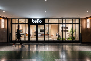 a man walk in front of beflo store in Japan Aoyama