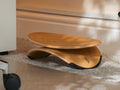 wooden footrest under standing desk at home office
